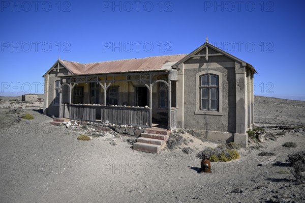 Dilapidated building in the desert sand, Pomona, restricted diamond area, near Lüderitz, Karas region, Namibia