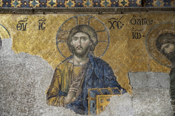 Deësis mosaic with Jesus Christ as Pantocrator in the interior of today's Hagia Sophia mosque or Church of St Sophia, former Byzantine church and museum in Istanbul, Turkey