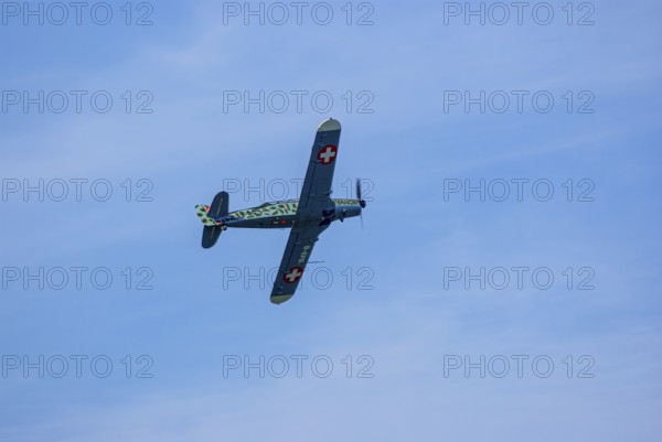 A Pilatus P-2 of Pilatus Flugzeugwerke AG with the registration D-EPII during a flight demonstration as part of an air show at the Rossfeld in Metzingen-Glems, Baden-Württemberg, Germany, for editorial use only