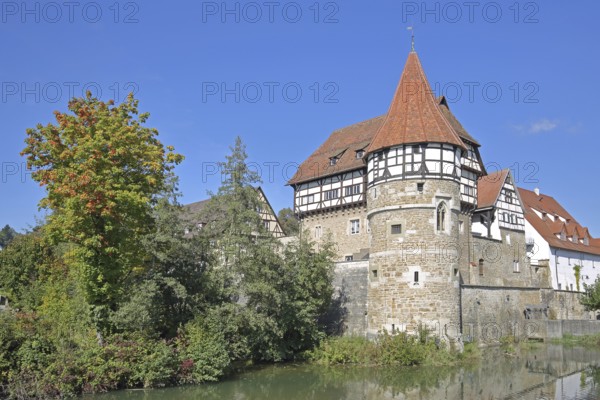 Zollern Castle built around 1255 with water tower on the Eybach stream, half-timbered house, autumn, castle, Balingen, Swabian Alb, Baden-Württemberg, Germany