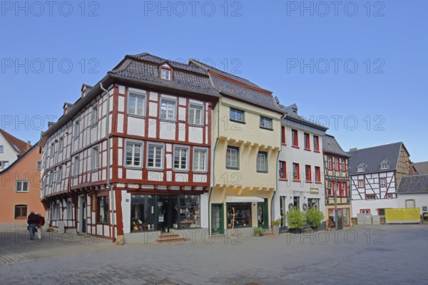 Half-timbered houses, pedestrians, Orchheimer Straße, Bad Münstereifel, Ahrgebirge, Eifel, North Rhine-Westphalia, Germany