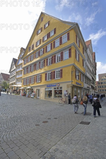 Yellow half-timbered house built in the 16th century, pedestrian, Holzmarkt, Tübingen, Neckar Valley, Baden-Württemberg, Germany