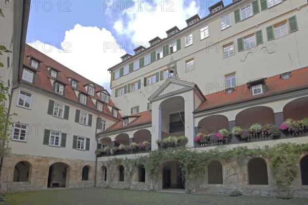 Protestant monastery built in 1534, inner courtyard with arcade and floral decoration, former Augustinian monastery, Tübingen, Neckar Valley, Baden-Württemberg, Germany