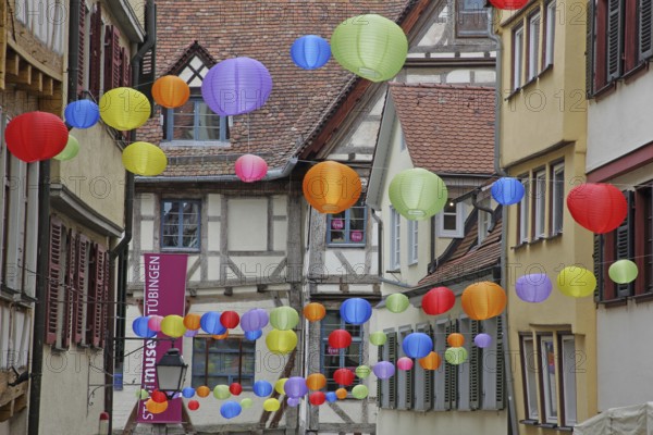 Houses in the Marktgasse with colourful lanterns, decoration, balloons, idyll, inscription, Stadtmuseum, Tübingen, Neckartal, Baden-Württemberg, Germany