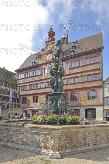 Neptune Fountain with sculpture of Neptune Roman god of the sea with trident, Renaissance Town Hall, Am Markt, Tübingen, Neckartal, Baden-Württemberg, Germany