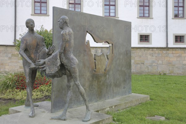 Sculpture Martin of Tours by Karl Ulrich Nuss, Saint Martin sharing his cloak with a beggar, symbol of Christian charity, horse figure, modern art, bronze sculptures, sharing, giving, taking, caring, Caritas, Martinusweg, pilgrimage route, Bischöfliches Ordinariat, Eugen-Bolz-Platz, Rottenburg am Neckar, Neckartal, Baden-Württemberg, Germany