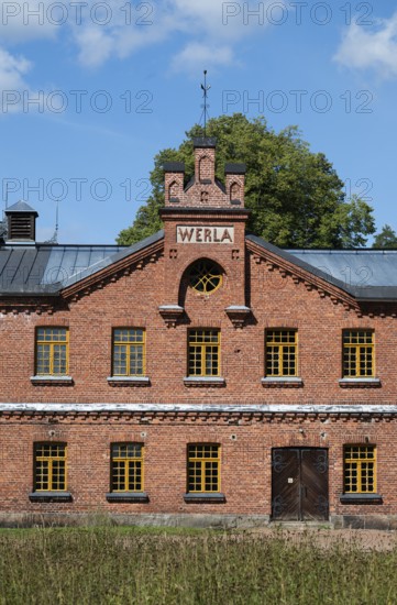 Brick façade with inscription Werla, former paper factory and mill for the production of groundwood pulp board, UNESCO World Heritage Site Factory Village Verla, Maailmanperintökohde Verlan puuhiomo ja pahvitehdas, Verla Rapids, Kymenlaakso, near Kouvola, Finland