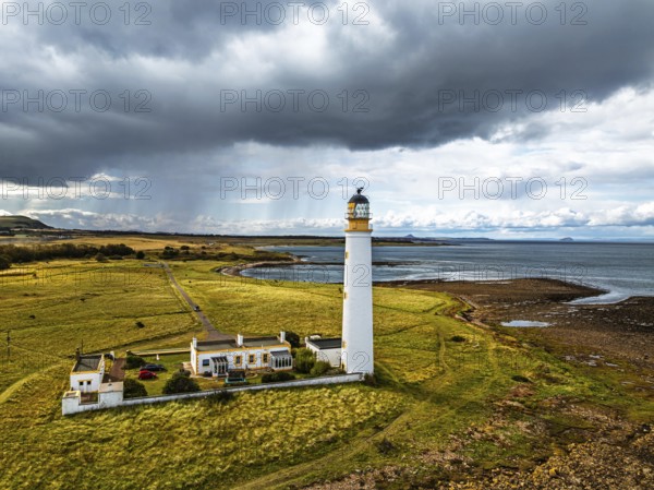 Rain Clouds over Barns Ness Lighthouse from a drone, Dunbar, East Lothian, Scotland, UK