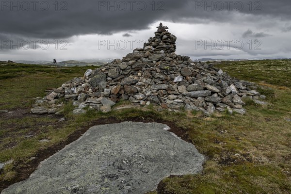 Stones deposited by pilgrims, stone pyramid, Allmannrøysa, Olav's Way or Olavsleden, old Kongevegen or King's Path over Dovrefjell, Norway