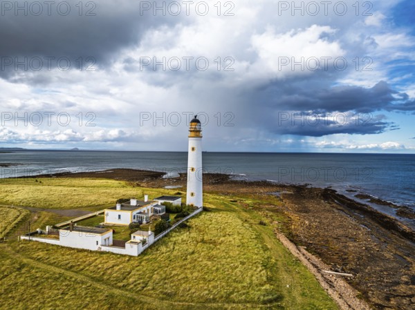 Rain Clouds over Barns Ness Lighthouse from a drone, Dunbar, East Lothian, Scotland, UK