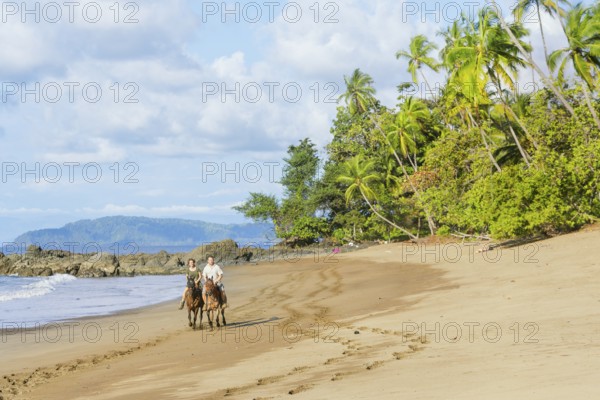 Horseback riding on beach, Drake Bay, Corcovado National Park, Osa Peninsula, Costa Rica