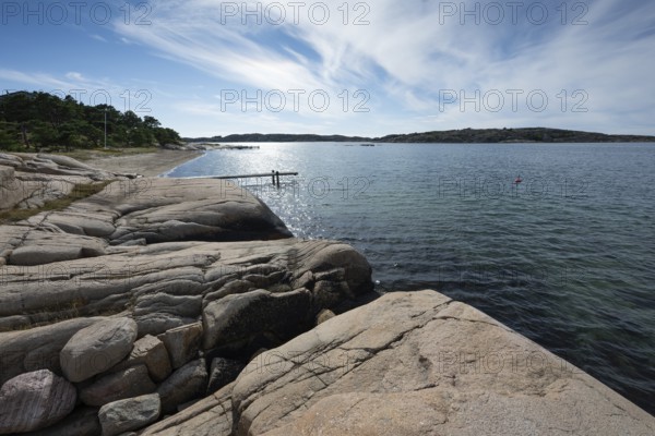 Granite rocks and beach with jetty, Resö Island, Bohuslän, Skagerrak, Sotenäs, Västra Götalands län, Sweden