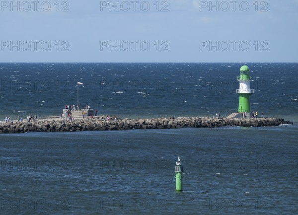 Green-white lighthouse, pier light west pier, waves, sea, Baltic Sea, Warnemünde, Rostock, Mecklenburg-Western Pomerania, Germany