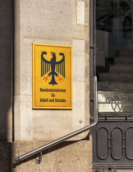 Yellow information signs, federal eagle with reference to federal ministries located there in the Berlin government district, Berlin, Germany