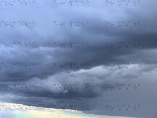 Gathering low pressure area with rain front dark stratus clouds Nimbostratus clouds, international