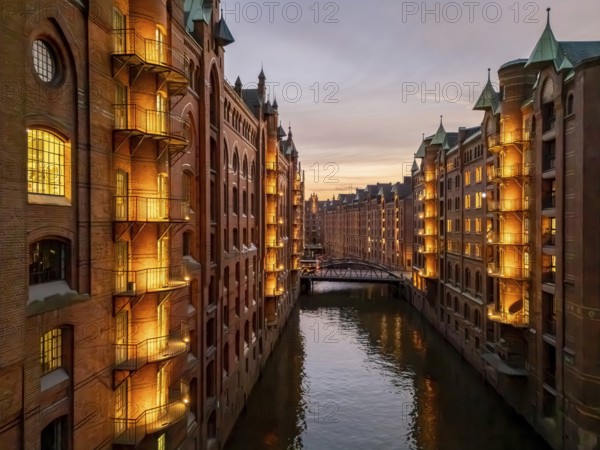 Hamburg warehouse district with evening lighting, Hamburg, Germany