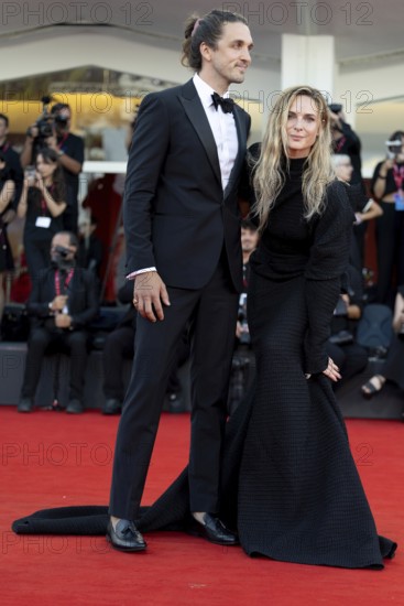 Venice, Italy - 2 September 2025: Rory St. Clair Gainer, Rebecca Ferguson during the Red Carpet of - A house of Dynamite - during the 82nd Venice International Film Festival