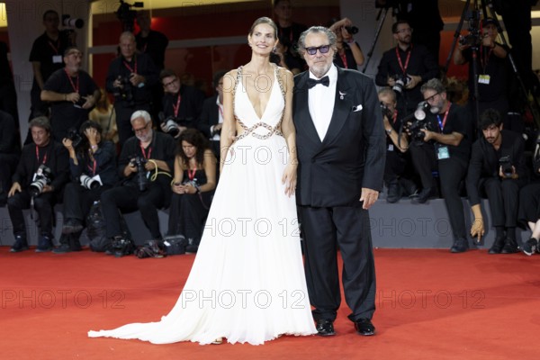 Venice, Italy - 3 September 2025: Louise Kugelberg and Julian Schnabel during the Red Carpet of - Cartier Glory To The Filmmaker Award 2025 and In the Hand of Dante - during the 82nd Venice International Film Festival