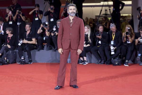 Venice, Italy - 3 September 2025: Oscar Isaac during the Red Carpet of - Cartier Glory To The Filmmaker Award 2025 and In the Hand of Dante - during the 82nd Venice International Film Festival