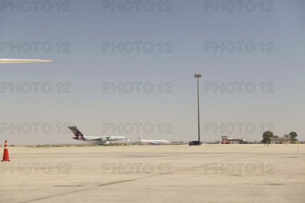 A Qatari aircraft carrying humanitarian and medical aid arrives at Damascus International Airport, received by Syrian Health Minister Musab al-Omar, the heads of the Qatari and Syrian Red Crescent, and Qatar's ambassador, Damascus, Damascus, Syria