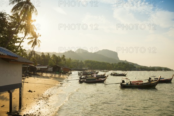 Fishing huts on the beach, sunset, Koh Mook, Trang province, southern Thailand, Andaman Sea, Thailand