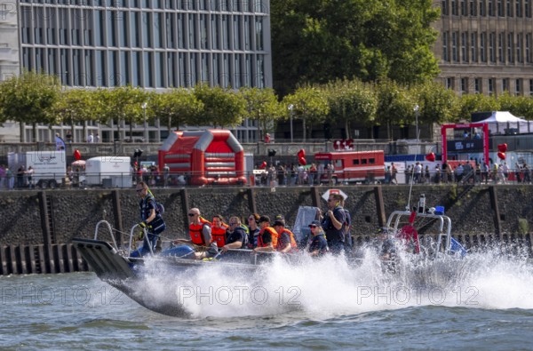 Multi-purpose boat of the THW during a training trip on the Rhine near Düsseldorf, the specialist group for water hazards, this type of boat is used to transport people and goods as a rescue boat and as a working platform, during the major exercise FÜLEX25, lasting several days, of the THW, Technical Relief Organisation, North Rhine-Westphalia regional association, over 3500 volunteers from the 127 North Rhine-Westphalia local associations practise many different deployment scenarios over 4 weekends