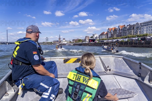 THW multi-purpose boats during a training trip on the Rhine, near Düsseldorf, of the Water Hazards Section, this type of boat is used to transport people and goods as a rescue boat and as a working platform, during the major exercise FÜLEX25, lasting several days, of the THW, Technical Relief Organisation, North Rhine-Westphalia Regional Association, over 3500 volunteers from the 127 North Rhine-Westphalia local associations practise many different deployment scenarios over 4 weekends