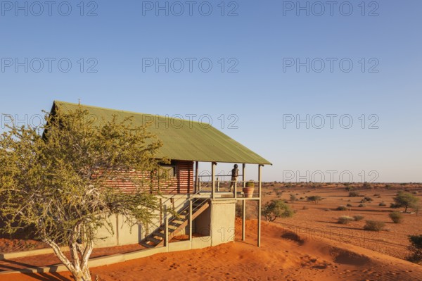 Some of the chalets of the Bagatelle Kalahari Game Ranch are built on top of a sand dune. Kalahari Desert, Namibia