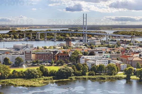 View from the tower of St. Mary's Church from a height of 84 metres over the city to the Rügen Bridge, behind it the island of Dänholm, at the very back the island of Rügen, Neuer Markt, Old Town, UNESCO World Heritage Site, Hanseatic City of Stralsund, Mecklenburg-Western Pomerania, Germany