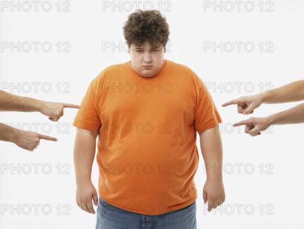 Overweight boy being judged by pointing fingers, symbolising fatshaming, bullying, judgement and discrimination based on his body weight. The image powerfully conveys the sense of shame, isolation and psychological distress associated with bullying and prejudice against obesity, AI generated
