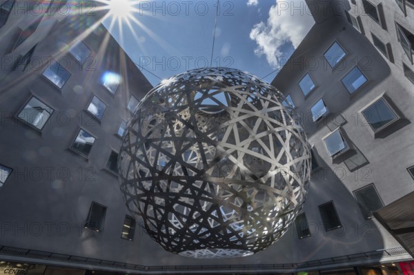Steel sphere, Sphere, a work of art by Ólafur Eliasson, Fünf Höfe shopping arcade, Munich, Bavaria, Germany