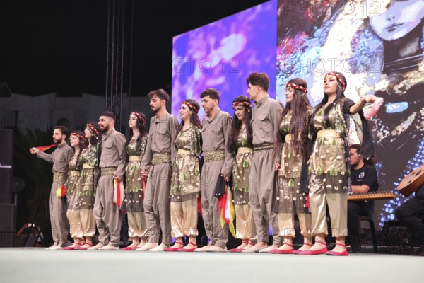 A Kurdish traditional dance troupe performs during the Damascus International Fair, the first edition held after the fall of Bashar al-Assad, showcasing cultural heritage and attracting visitors to the exhibition, Damascus, Damascus, Syria