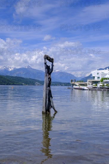 Statue of St Domitian by Giorgio Igne in Lake Millstatt, Millstadt, Carinthia, Austria