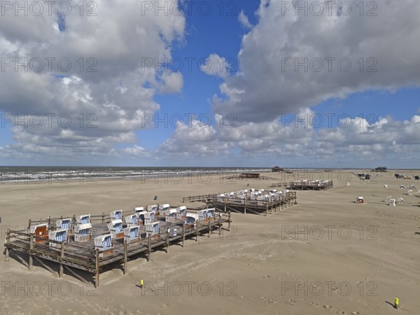 North Sea beach, blue sky, white clouds, summer, sun, sand, beach chairs on a platform, on the edge of the UNESCO World Heritage Site, Ording, Sankt Peter-Ording, Schleswig-Holstein, Germany