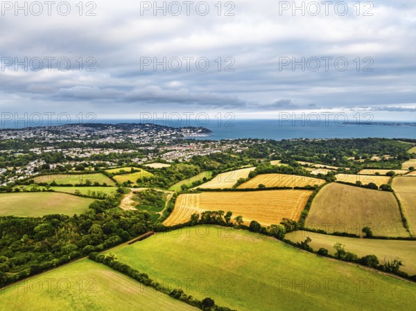 Colors of Fields and Farms over Torquay from drone, Torbay, Devon, England, United Kingdom