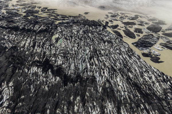 Icebergs, ice floes, glacier tongue, glacier edge, glacier, glacier lagoon, aerial view, black ice, climate change, summer, Skeidararjökull, Skaftafell, Vatnajökull National Park, Iceland