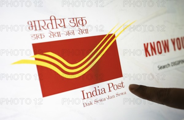 New Delhi, India – August 23, 2025: In this photo illustration, the India Post logo is seen on a digital display. The Indian Department of Posts has announced a temporary suspension of most postal services to the United States from Aug 25