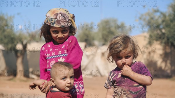 Syrian children playing in a refugee camp near the Turkish border on World Children's Day. Aleppo, Syria October 29, 2022, Aleppo, Syria