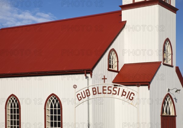 Church in Vopnafjördur with lettering on the entrance gate, East Iceland, Iceland
