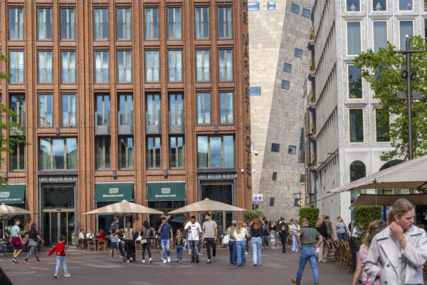 The Grote Markt in the old town of Groningen, modern facades of hotel and commercial buildings, in the centre the Forum Groningen, gastronomy, Netherlands