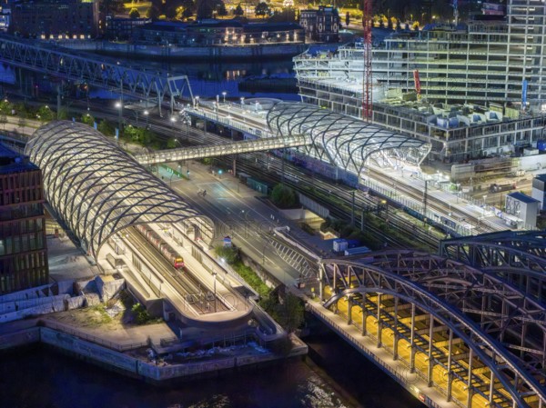 Blue hour aerial view of the Hamburg Elbbrücken U4 underground and suburban railway station and the Elbtower construction site, Hamburg, Germany