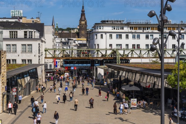 The Wuppertal suspension railway arrives at the Döppersberg stop in the city centre of Wuppertal, Germany