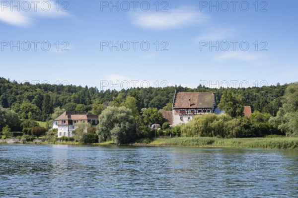 View over the Rhine, Hochrhein to the historic Bibermühle mill near Rheinklingen, Canton Thurgau, Switzerland