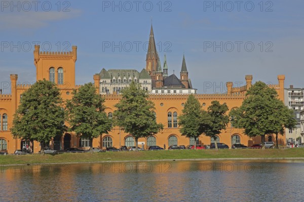 Pfaffenteich with arsenal, church tower of St Paul's Church, shore, lake, Schwerin, Mecklenburg-Western Pomerania, Germany
