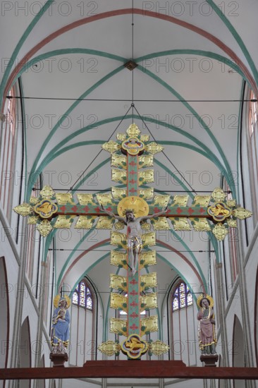 Gothic golden triumphal cross from 1420 with church patron Saint John the Apostle and Mary in the UNESCO Cathedral of St Mary and St John, interior photo, Schwerin, Mecklenburg-Western Pomerania, Germany