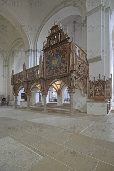 Rood screen with Gothic clock built in 1477, interior view, church clock, Lübeck Cathedral, Schleswig-Holstein, Germany