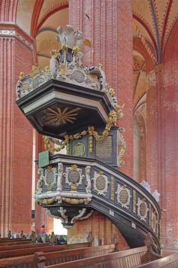 Pulpit with pulpit bonnet built in 1708, baroque, decorations, wood carvings, craftsmanship, art, pulpit lid, sounding board, pulpit canopy, brick gothic, brick church, UNESCO, St. Nikolai Church, Wismar, Mecklenburg-Western Pomerania, Germany