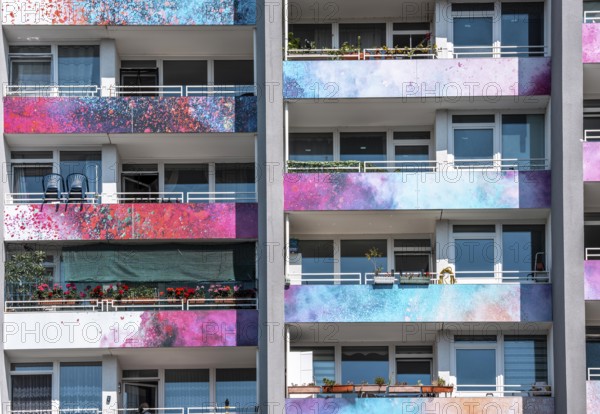 High-rise residential building, in Essen-Steele, with colourfully designed façade, balcony balustrades, after renovation, North Rhine-Westphalia, Germany