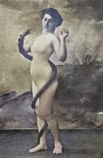 Nude woman from around 1899, erotic postcard, playgirl, naked woman with snake, mystical landscape, dramatic effect, coloured, reproduction of a photo from around the turn of the century, historical, digitally restored reproduction of an old original, exact date unknown