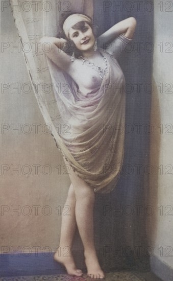 Female nude from around 1899, erotic postcard, playgirl, woman in antique veil posing on a wall, coloured, reproduction of a photo from around the turn of the century, historical, digitally restored reproduction of an old original, exact date unknown